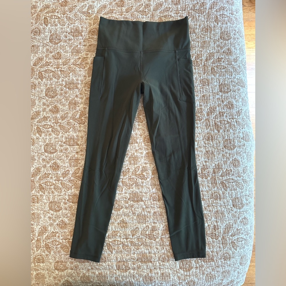 Athleta Salutation Stash Pocket II 7/8 Tight Olive Green